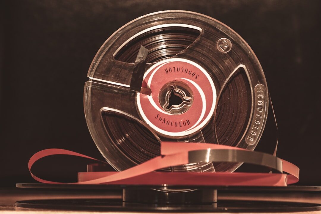 Stack of vintage television archive film reels on a shelf