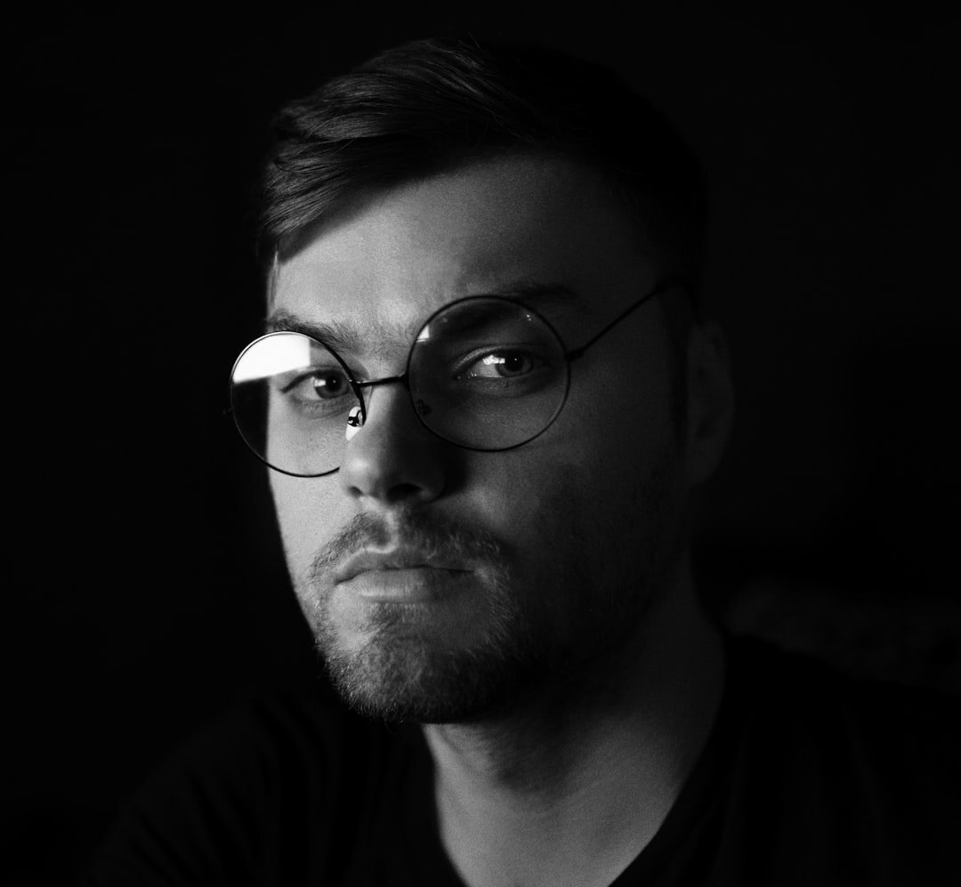 Portrait of a bearded man archivist in a casual shirt
